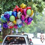 A vendor selling colorful balloons to attract customers at F6 area in the Federal Capital