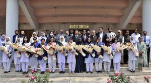 Caretaker Federal Minister for Education & Professional Training Madad Ali Sindhi in a group photograph with position holder students during Federal Board of Intermediate and Secondary Education (FBISE) Result Declaration ceremony of HSSC Part I & II, 1st Annual Exam 2023
