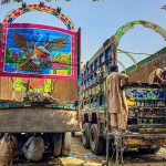 Workers busy in repairing truck body at Pirwadhai