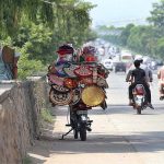 A vendor selling handmade stuff to attract customers at Expressway in the Federal Capital