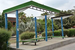 A view of damaged bus stop shed at Jaranwala Road needs the attention of concerned authorities