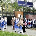 Students attending school after the summer vacation on the opening day after two month at G-7 sector