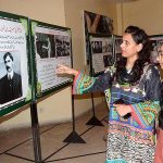 Visitor women watching the Photographic Exhibition of Quaid e Azam in connection to the upcoming independence day at the Arts Council
