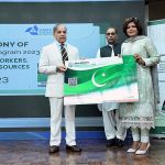 Prime Minister Muhammad Shehbaz Sharif distributing health insurance cards among the working journalists, media workers, artists and technical resource workers