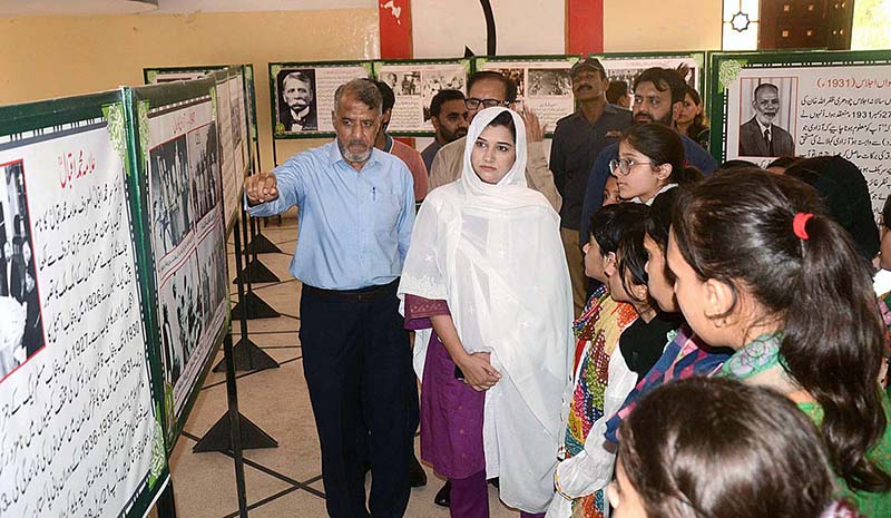 Visitor women watching the Photographic Exhibition of Quaid e Azam in connection to the upcoming independence day at the Arts Council