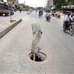 A view of open main hole at Hala Naka Road may cause any mishap and needs the attention of concerned authorities