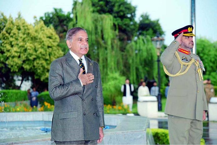 The outgoing Prime Minister Muhammad Shehbaz Sharif being presented Guard of Honor at Prime Minister's House