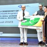 Prime Minister Muhammad Shehbaz Sharif distributing health insurance cards among the working journalists, media workers, artists and technical resource workers