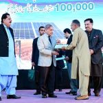 Prime Minister Muhammad Shehbaz Sharif giving certificates to farmers during the launching ceremony of National Program for the Solarization of Agricultural Tubewells