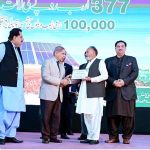 Prime Minister Muhammad Shehbaz Sharif giving certificates to farmers during the launching ceremony of National Program for the Solarization of Agricultural Tubewells