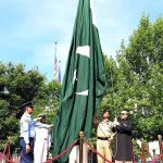 Ambassador of Pakistan to the United States, Masood Khan unfurling the National Flag on the occasion of Independence Day of Pakistan at Embassy of Pakistan