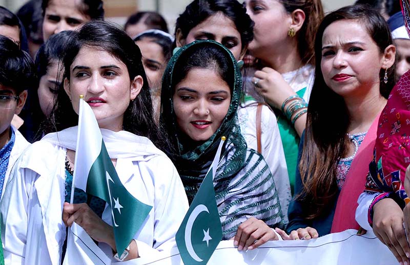 ISRA University officials hoist the national flag to celebrate Independence Day celebration