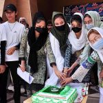 Students are cutting Independence Day Cake in a ceremony of international Youth Day organized by Sports Department and Peoples social welfare