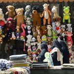 Vendor selling and displaying used toys to attract the customers at Sahi Katha