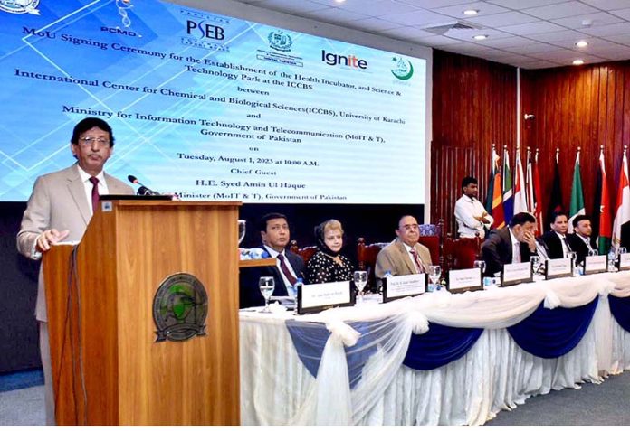 Federal Minister for IT and Telecommunication Syed Amin ul Haque addressing the the MOU Signing Ceremony for the Establishment of the Health Incubator and Science Technology Park at the ICCBS between Ministry IT and Telecommunication ICCBS University of Karachi