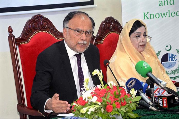 Federal Minister for Planning and Development and Special Initiatives Professor Ahsan Iqbal talking to the media persons at Gohar Town