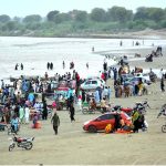 Numerous families are relishing a picnic by the Indus River during overcast weather, following the rise in water level in the river