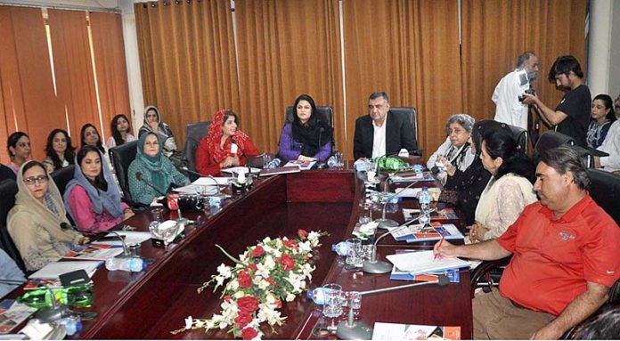 Parliamentary Secretary for Education, Professional Training Ms. Zeb Jaffar is being briefed about the producing printed Materials for children with dyslexia at National Book Foundation