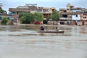 Fishermen on boat catching fish at Phuleli Canal