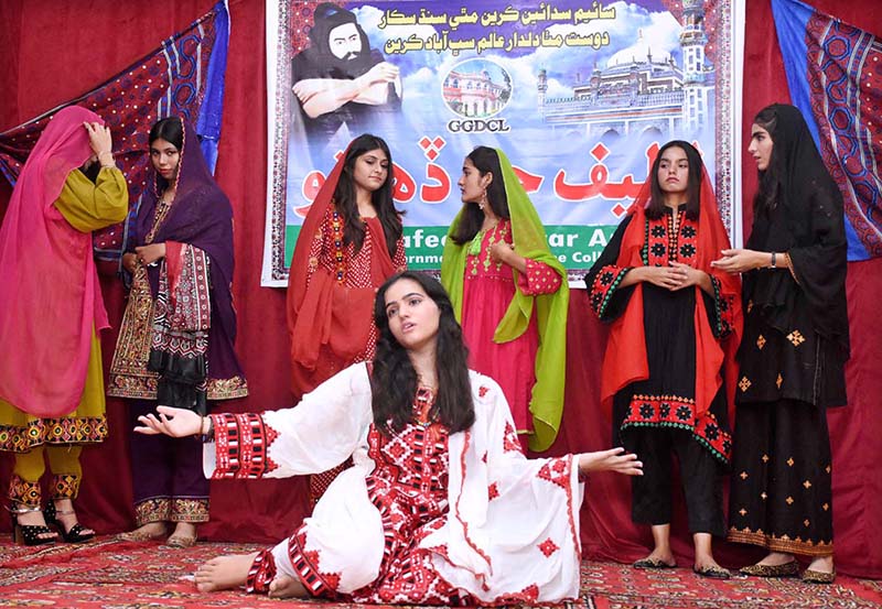 Students performing in tableau during Latif Day Function at Government Girls Degree College