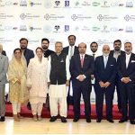 President Dr. Arif Alvi in a group photo with healthcare professionals attending the Instacare Future Health Forum 2023 on Advancing Healthcare with Artificial Intelligence and Machine Learning