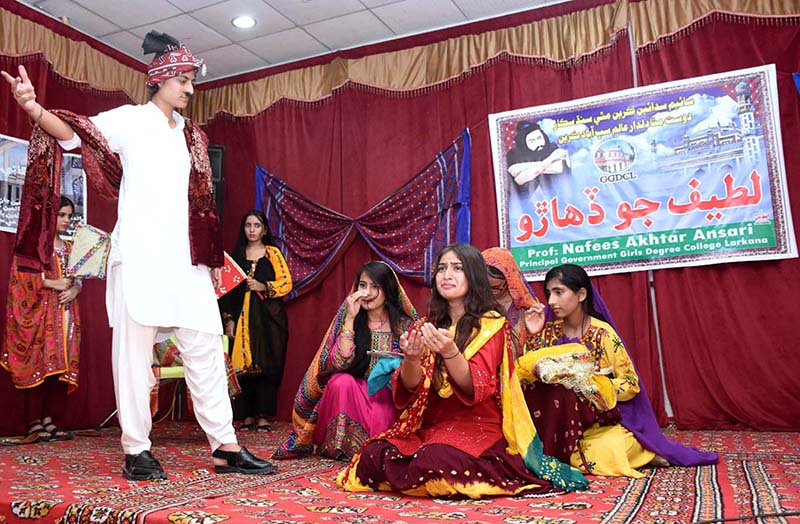 Students performing in tableau during Latif Day Function at Government Girls Degree College