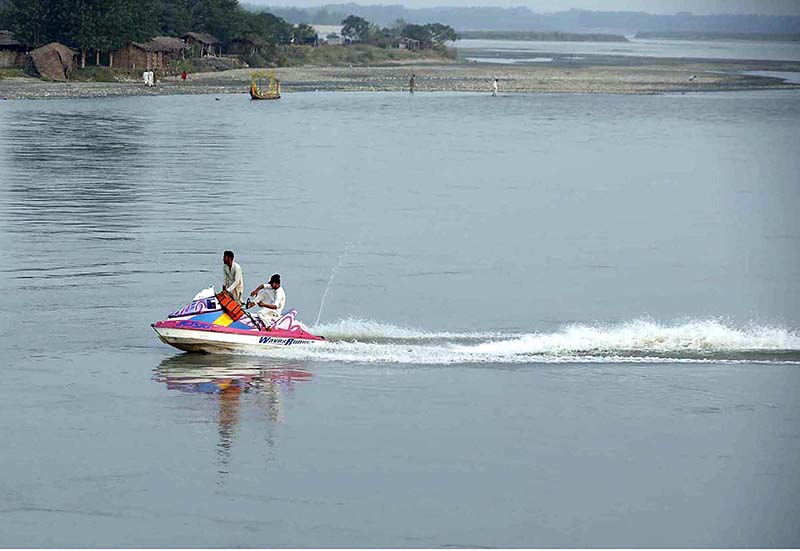 Tourists enjoy jet ski ride at Sardaryab picnic point