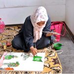 Students participating in a painting competition in connection with independence day celebrations organized by the Punjab Council of Arts Multan division at the Arts Gallery