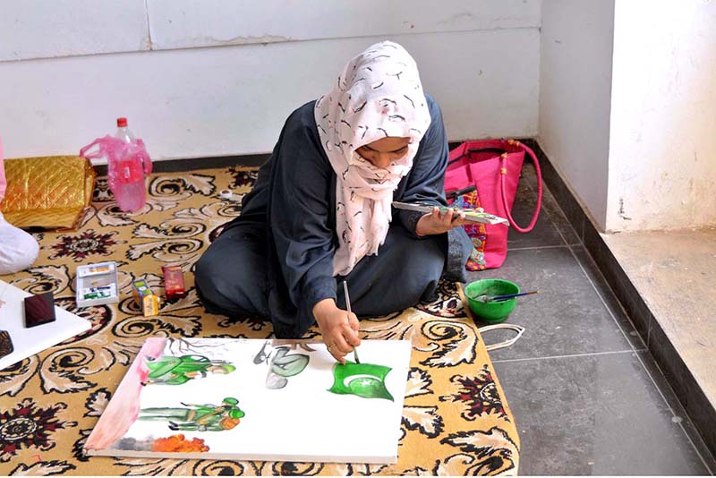 Students participating in a painting competition in connection with independence day celebrations organized by the Punjab Council of Arts Multan division at the Arts Gallery