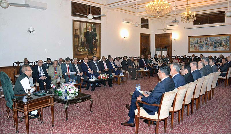 President Dr. Arif Alvi chairing a meeting with representatives of banking industry to review progress on initiatives for financial inclusion, gender equality and issues of banking sector at Sindh Governor House