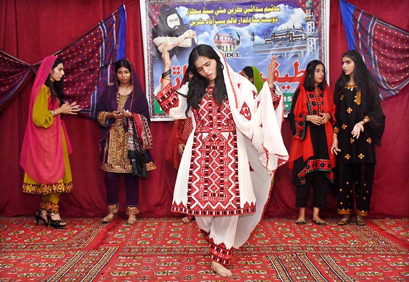 Students performing in tableau during Latif Day Function at Government Girls Degree College