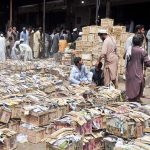 Labourers display fruit boxes at Fruit and Vegetable Markets