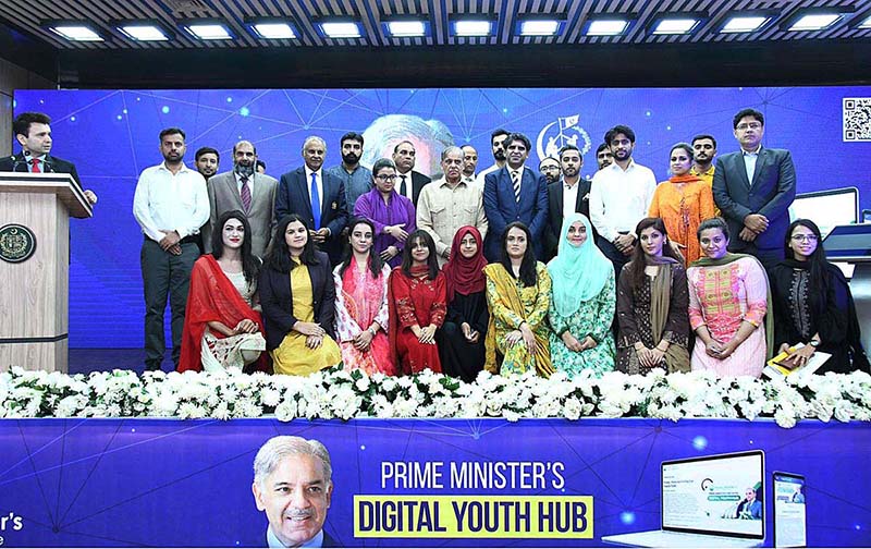 Prime Minister Muhammad Shehbaz Sharif in a group photo with officials of Prime Minister's Youth Program