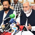 Coordinator to the Prime Minister Khawaja Ahmad Hassan is addressing a press conference at Camp office Iqbal lawn