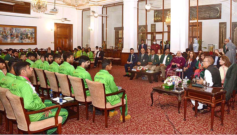 President Dr. Arif Alvi, accompanied by the Begum Samina Arif Alvi, speaking at an interactive session with Special Olympics Pakistan delegation World Summer Games Berlin 2023 at Governor House