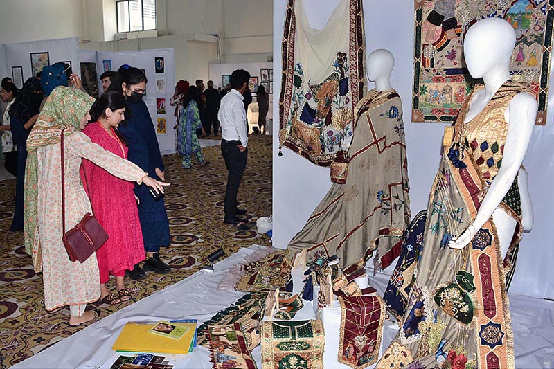 Students visiting stalls during 13th Thesis Display of School of Arts and Designing at National Textile University (NTU)