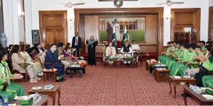 President Dr. Arif Alvi, accompanied by the Begum Samina Arif Alvi, speaking at an interactive session with Special Olympics Pakistan delegation World Summer Games Berlin 2023 at Governor House