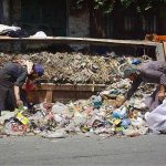 Gypsies collecting usable items from the garbage at Lahori Chowk