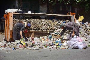 Gypsies collecting usable items from the garbage at Lahori Chowk