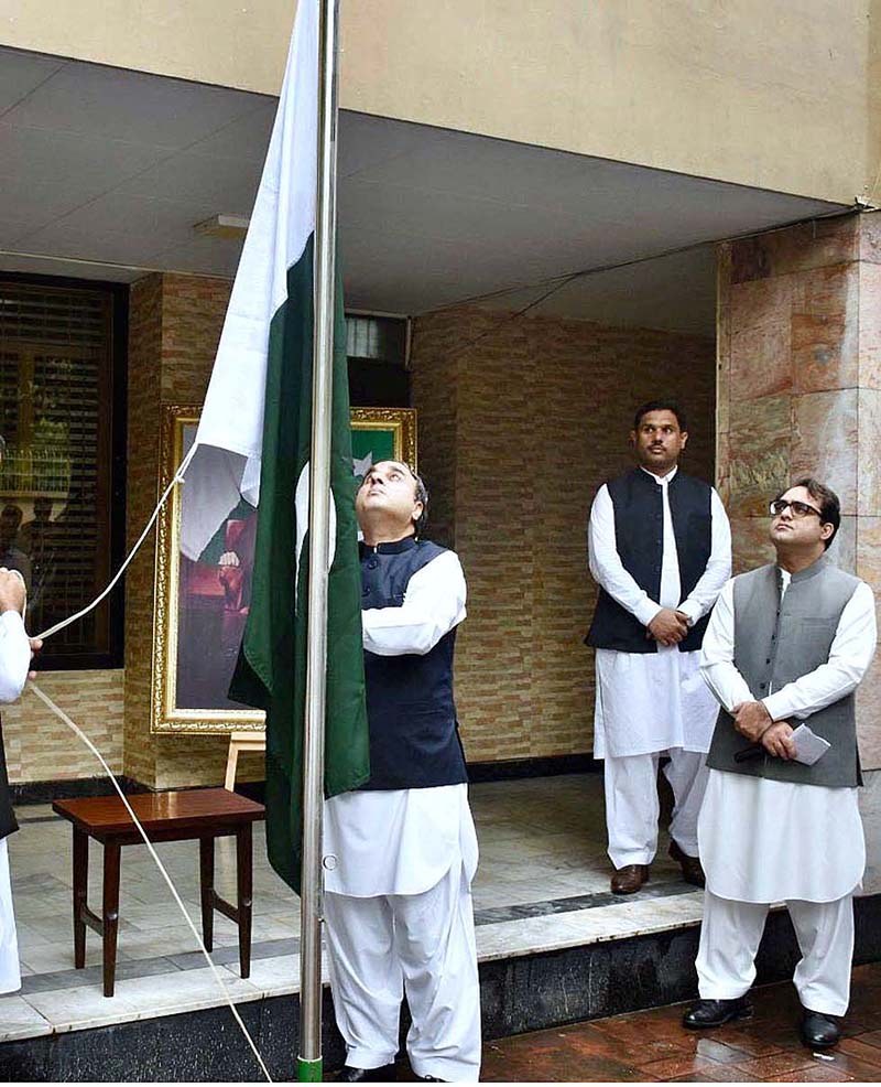 Pakistan's High Commissioner to Bangladesh, Mr. Imran Ahmed Siddiqui hoisting National flag to mark the 76th anniversary of Independence Day of Pakistan at Pakistan High Commission