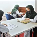 Students studying in the newly inaugurated Public Library at Women Degree College