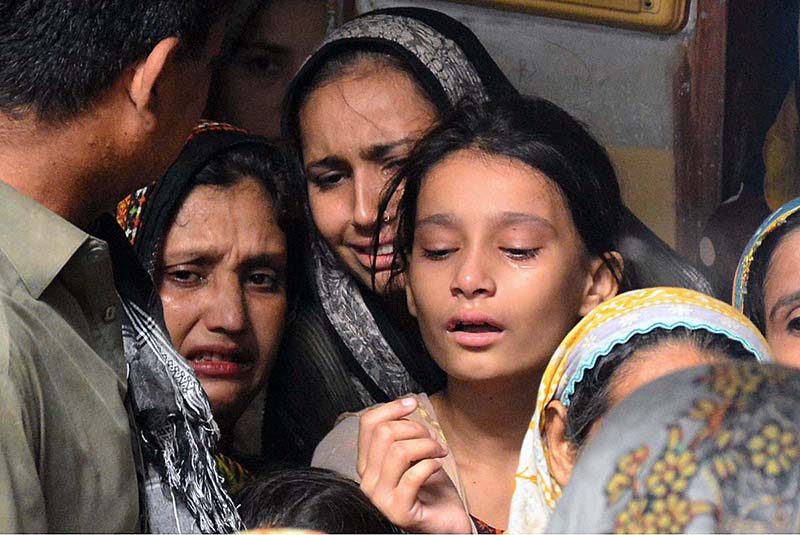 Relatives are sad for 72 years lady Sharifa for a train accident victim after the derailment of a passenger train in Nawabshah at phuleli bazar atleast 35 people were killed in Hazara express