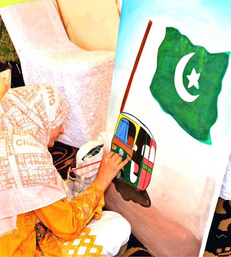 Student giving Final touches to her painting during Independence Day Painting Competition