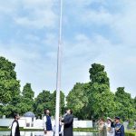 Aizaz Khan, charge d'' Affaires hoisting National flag to mark the 76th anniversary of Independence Day of Pakistan at Pakistan High Commission