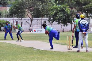 A view of a cricket match played between Journalist Cricket teams during the First All Multan Journalist Cricket Tournament at Sports Complex Government Model High School Gulgasht