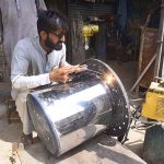Workers preparing Steel Gas Tandoor at his workplace at Charsadda Road