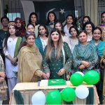 Professor Dr. Fariha Nighat along with the Students cutting cake on the occasion of 77th Independence Day celebration at Government College for Women Dhoke Elahi Bakhsh