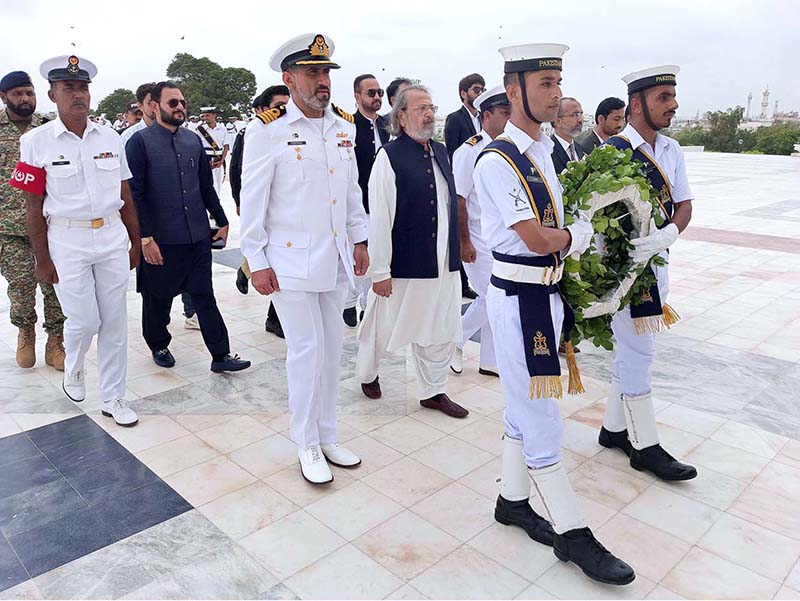 Caretaker Federal Minister for Education and Professional Training, Madad Ali Sindhi coming to lay floral wreath during visit at Mazar-e-Quaid.