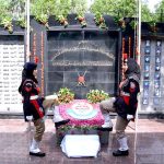 Railways Police squad presenting honorary salute to the martyrs of Railways Police on Police Martyrs Day