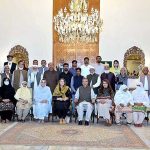 President Dr Arif Alvi in a group photo with a delegation of Old Age Home, Aafiyat, Multan, at Aiwan-e-Sadr